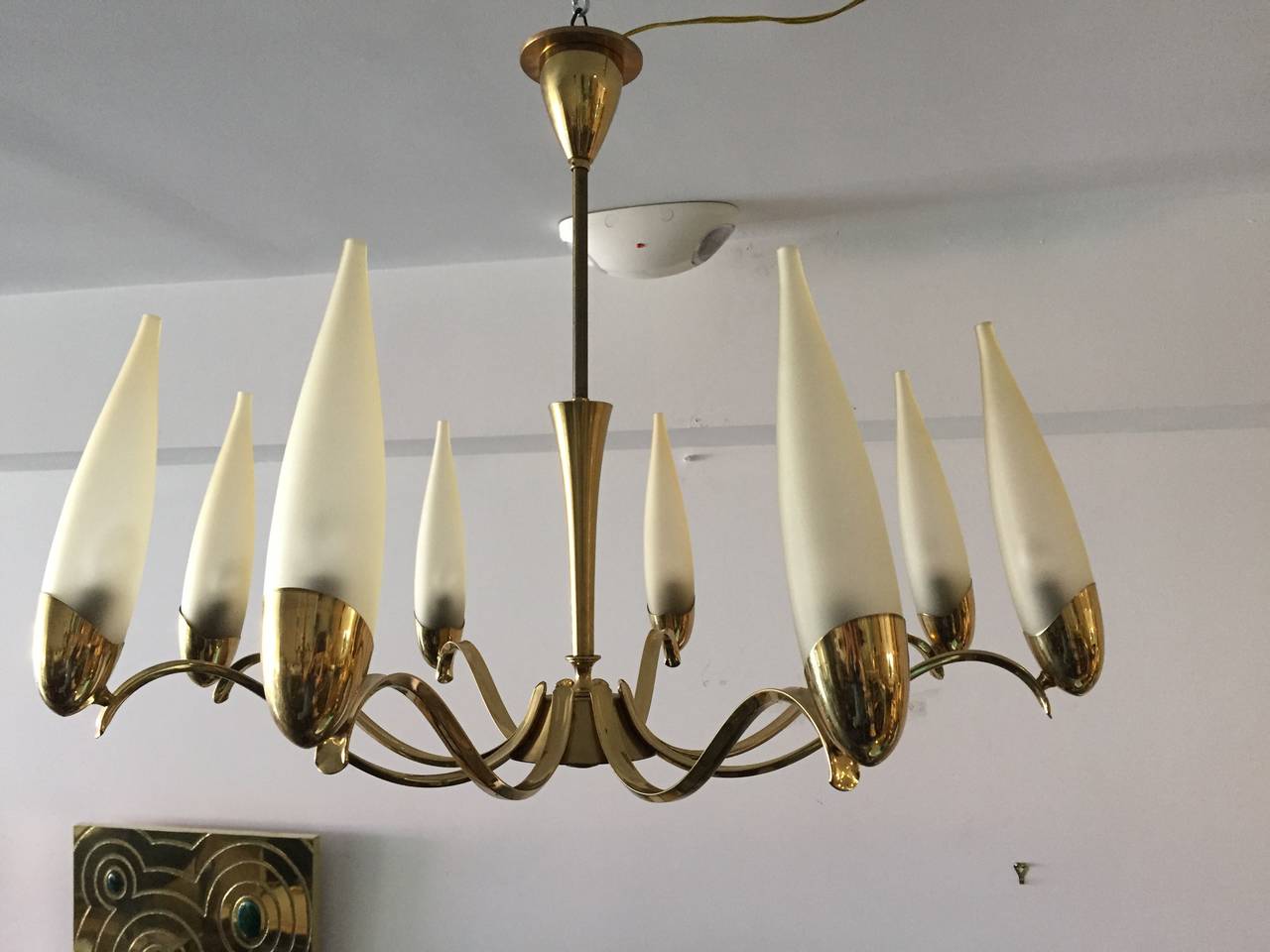 Stilnovo eight-arm brass and glass chandelier.