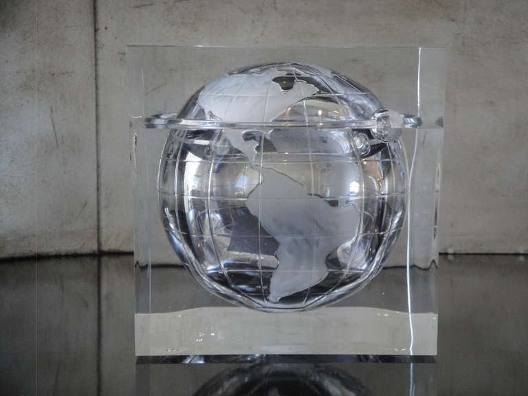 Beautiful Lucite globe motif ice bucket / candy dish with rotating top.