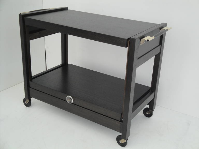 Mid-Century Modern expandable ebonized mahogany bar cart by Brown Saltman.