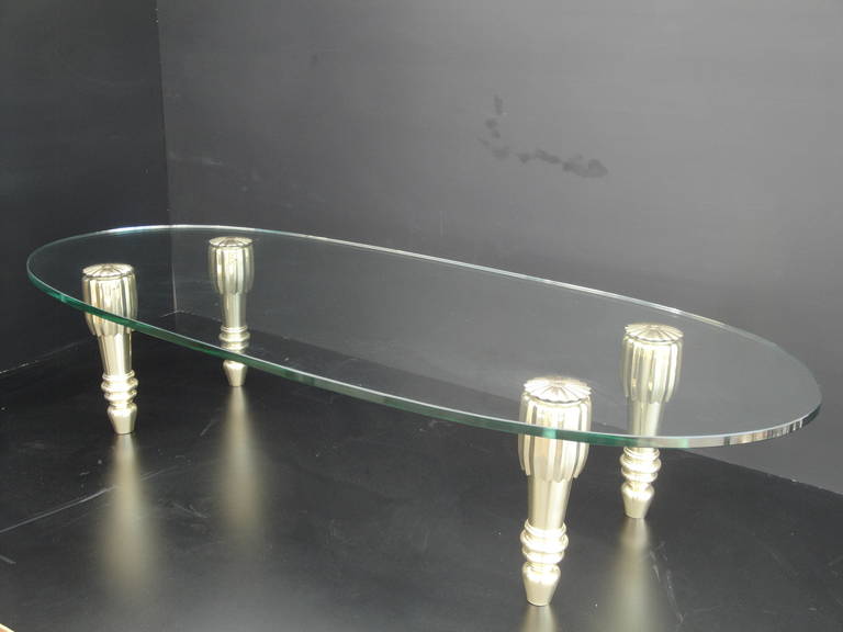 Brass and glass coffee table in the style of P.E. Guerrin
Offered at Gallery Girasole