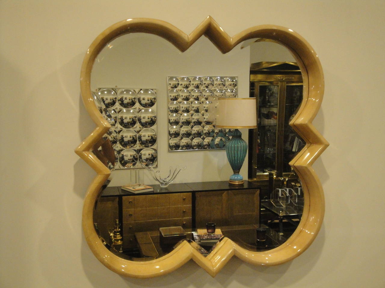 Quatrefoil parchment mirror.