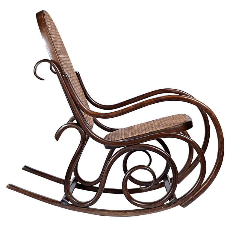 A children’s bentwood rocking chair in a natural stain with rattan seat and back. By Marchio Di Fabbrica Depositato. Italian, circa 1900.

Excellent vintage condition, seat recently recaned.