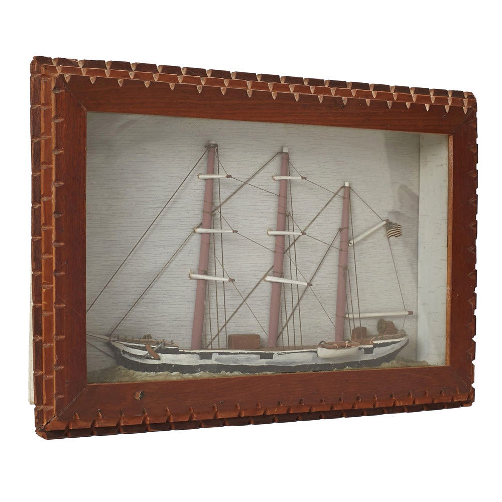 A unique diorama of the Charles W Morgan, the last whaling ship in the US. Handmade and set within a Tramp Art shadow box frame. With paper inscriptions. American, circa 1900.