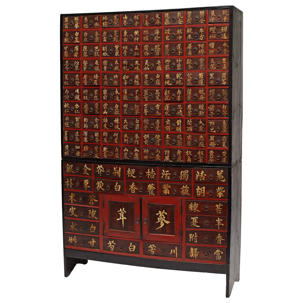 A gorgeous wood medicine chest in wonderful condition and vibrant color. Each drawer is inscribed in Chinese with different contents of herbs belonging in each drawer.