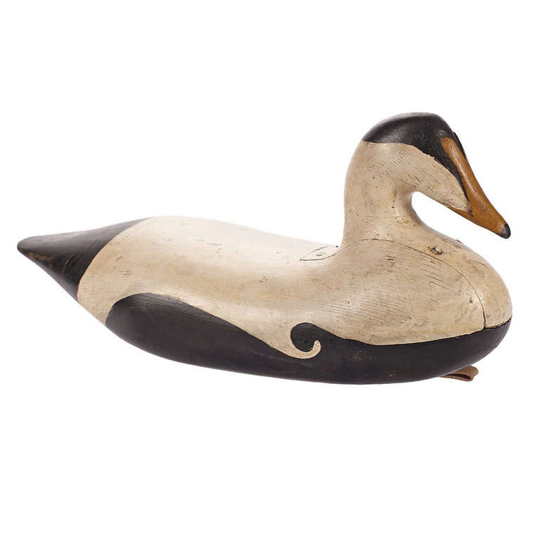 A gorgeous black and white Eider duck decoy. Signed to the bottom 'Bob Biddle'. American, 20th century. Came from a collector in Maine.