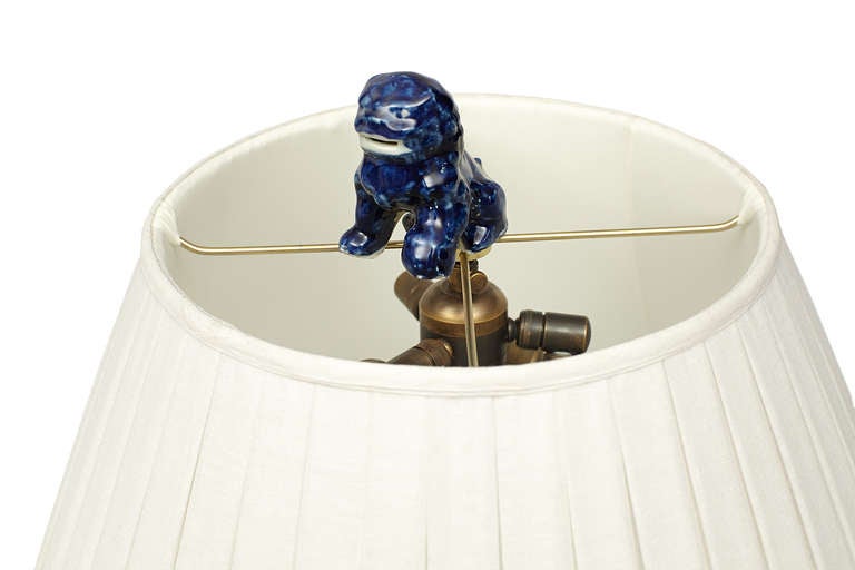 Pair of Chinese Temple Jar Lamps from Early 20th Century. Porcelain jars with custom linen shades with Greek key trim.