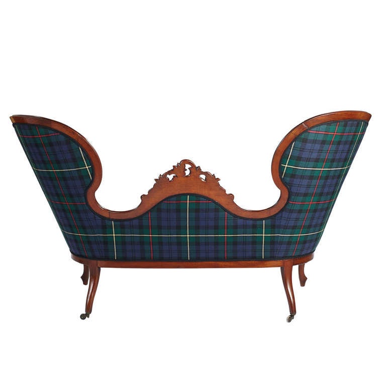 Newly upholstered carved mahogany settee in a Stewart Hunting Tartan.