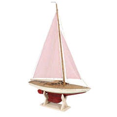 Vintage Model Sailboat with Red and White Sear-Sucker Sails
