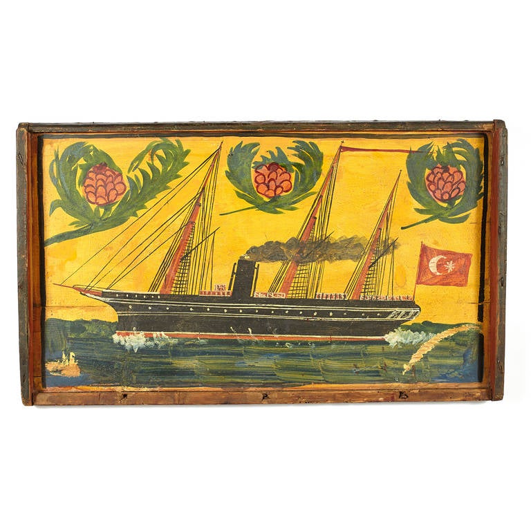 Turkish Folk Art painting of ship on lid of wooden trunk.