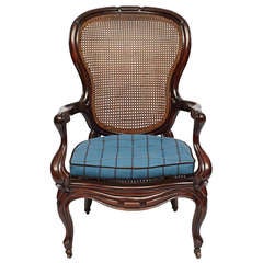 Victorian Rococo Revival Mahogany Cane Back Armchair