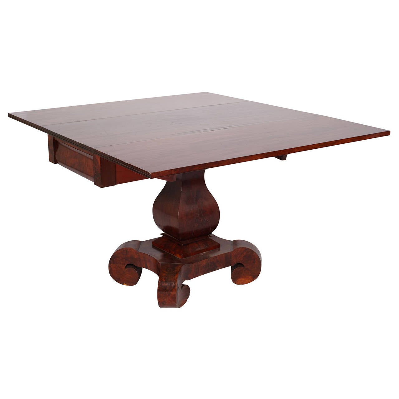 American Empire Mahogany Drop-Leaf Table. Early 19th Century. Rectangular top opens to 42