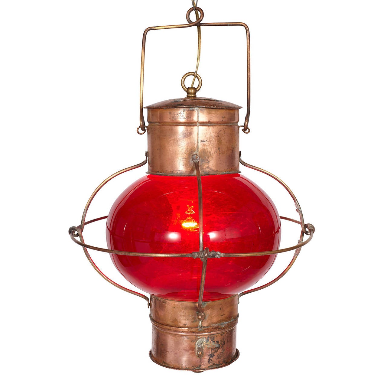 Hanging ship's lantern with red glass and metal fixtures.  American, early 20th century.
