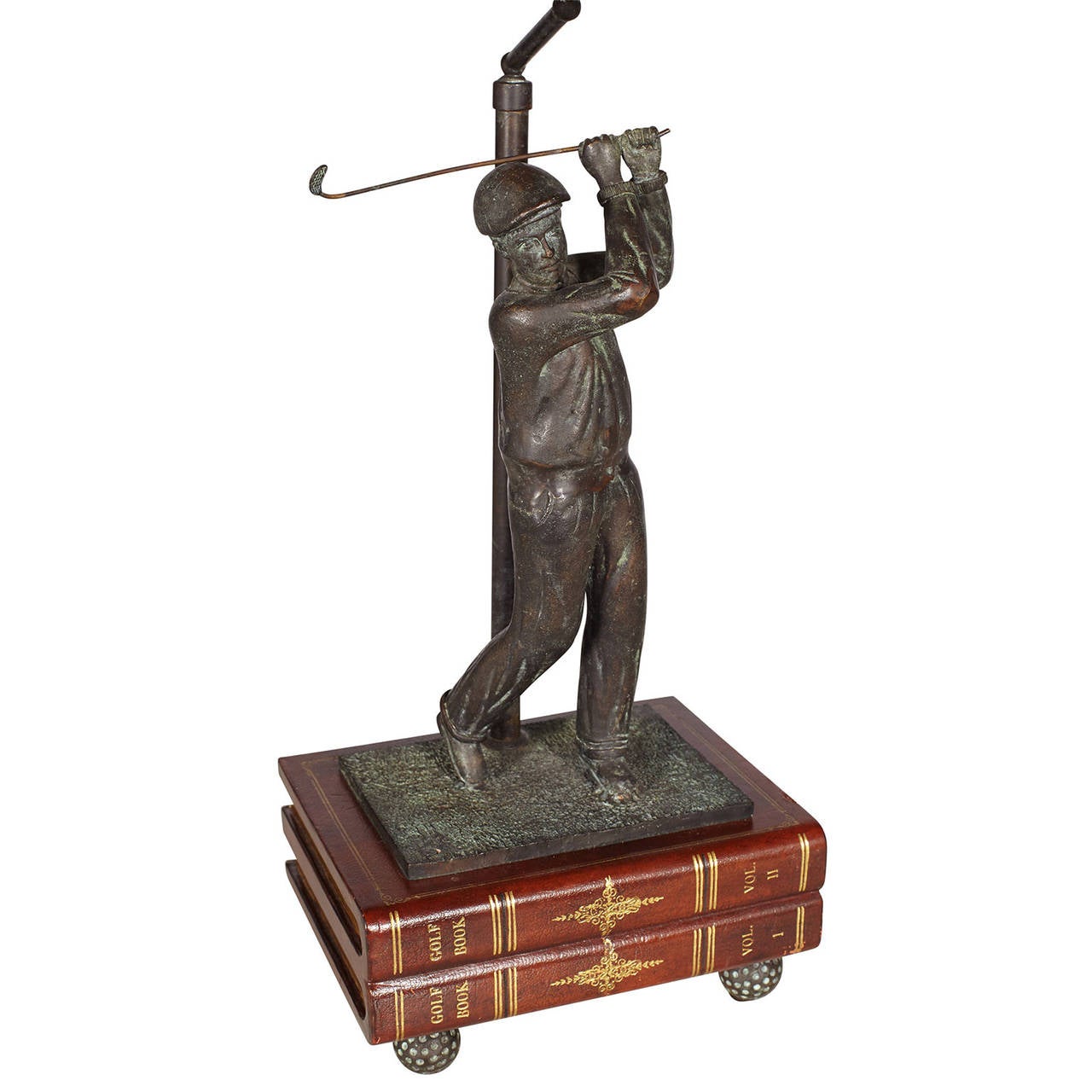 Bronze lamp featuring a man golfing, base of marble and wood, with finial and bronze feet in the form of golf balls. By Maitland Smith. Linen Shade.