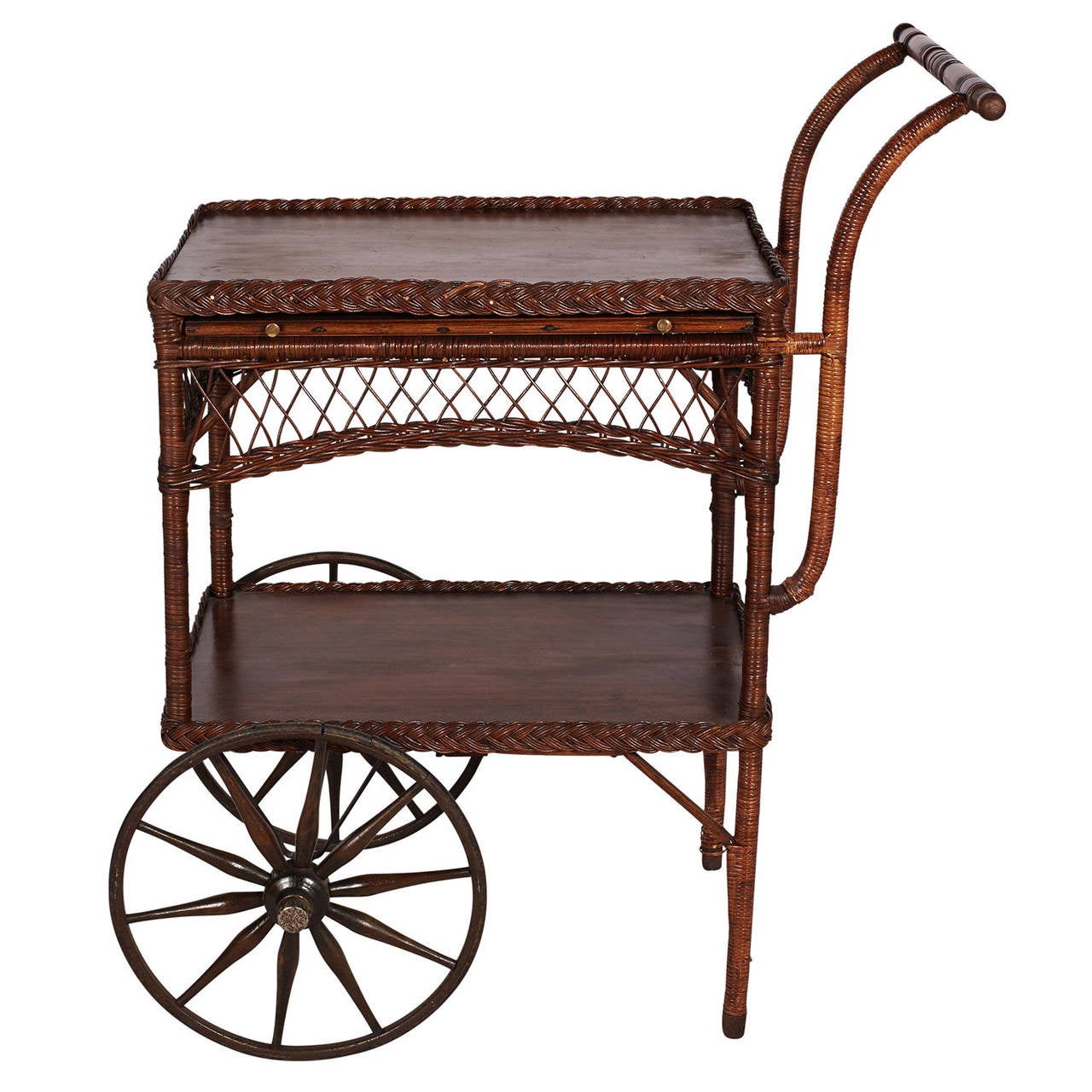 A beautiful Haywood Wakefield tea cart made of oak with wicker detailing. Cart features 2 slide out shelves on each side.