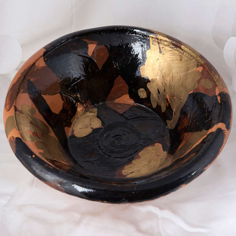 Unique pottery, glazed in black and gold, signed H 79. Made in 1979.