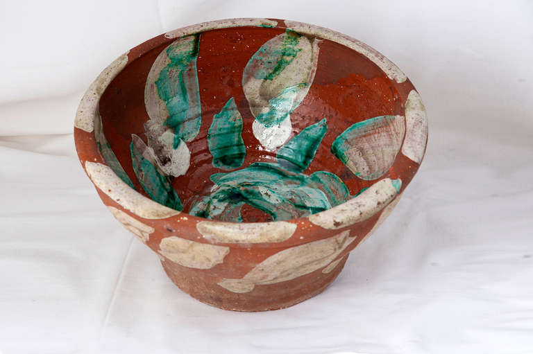 Unique earthenware bowl, painted with engobe in green and white, glazed but transparanent pottery glaze, signed HERTHA HILLFON 1970