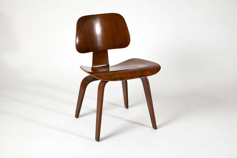 Starting as an experiment of molding plywood in the so called “Kazam! Machine”, the iconic “Dining Chair Wood” has been hailed as Best Design of the 20th Century by the Time magazine. 
(Quote:) 