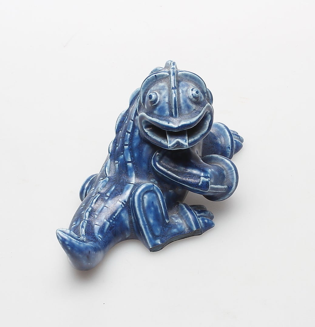 Rare blue figurine, signed and produced in the 1940s, Gustavsberg, Sweden.
Kages dragon sculpture was inspired from China, but is mostly a result of his fantasy world. He developed this idea into a dragon fish in the beginning of the 1950s. This