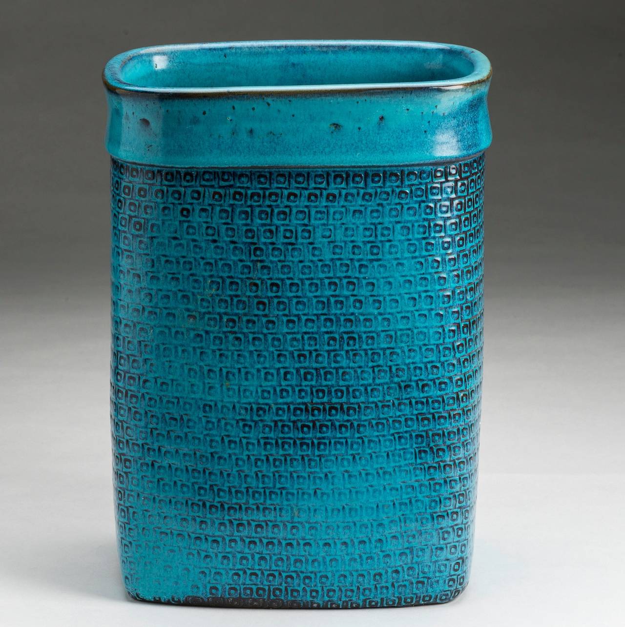 This turquoise and brown glazed vase of Stig Lindberg has a firing crack at the bottom and leaks. Produced at Gustavsberg, Sweden in 1965. Height 33 cm.