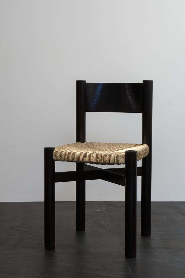 Charlotte Perriand (1903-1999)

Straw seat chair,
circa 1950.

Black lacquered wooden structure with straw seat.

Design for Méribel, France.