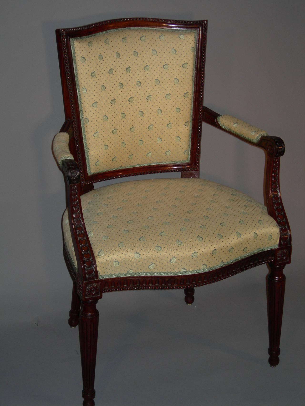 Suite of Twelve Dutch Louis XVI Chairs and Three Armchairs
