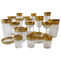 An extensive St. Louis Thistle pattern gilt crystal table service