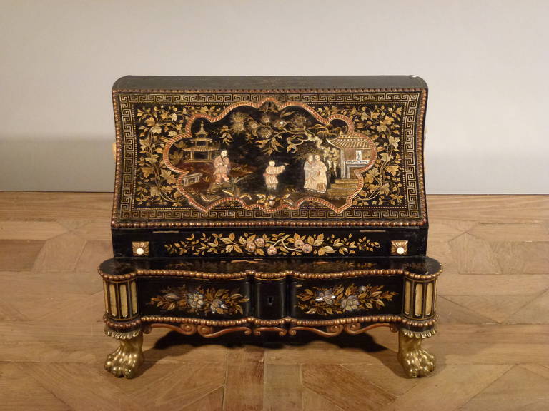 Adrianus Apol, a painter of lacquer, 'peinturier' and merchant from Breda (South of the Netherlanlds), decorated this table secretary in the style of Chinese and Japanese lacquerwork. He imitated not only the lacquer work, but also the style of