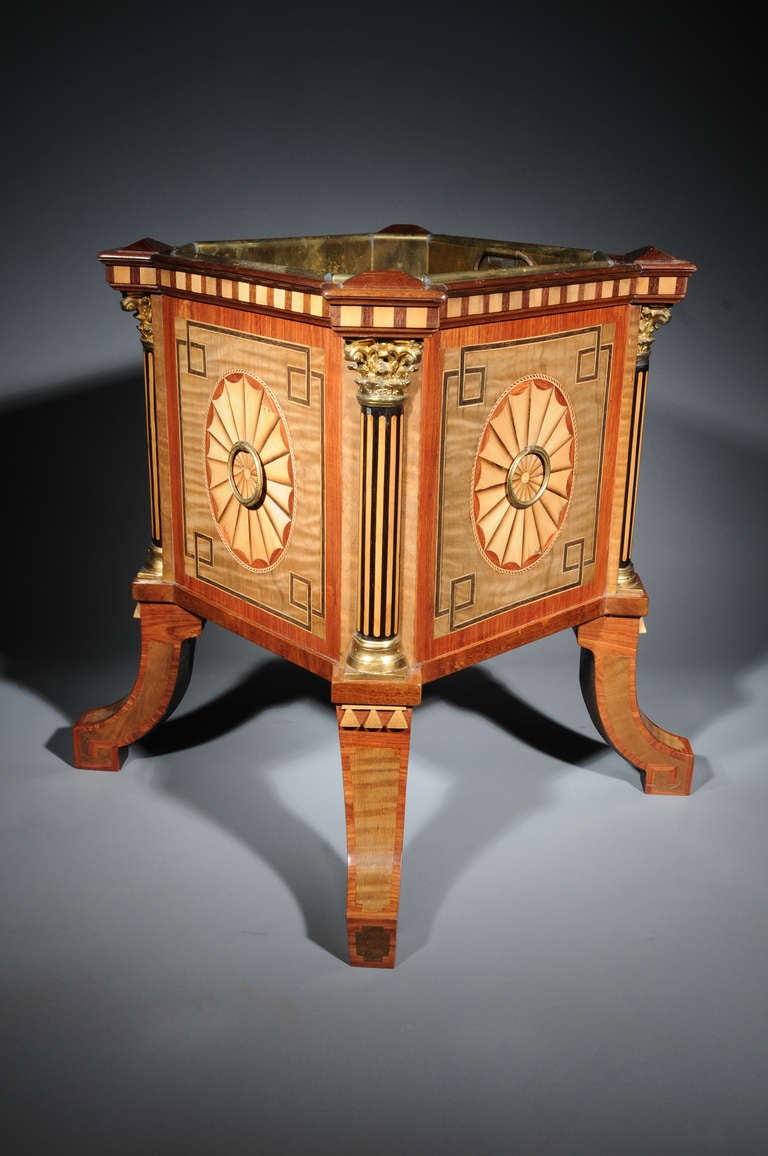 square shaped, each side with fan-shaped marqueterie within a meander border, the bevelled edges are placed on Corinthian half-columns of ebony with an intarsia of 