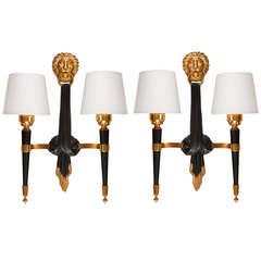 Pair of French lacquered metal and brass wall sconces