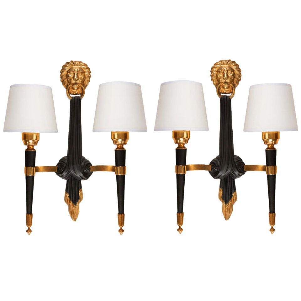 Pair of French lacquered metal and brass wall sconces