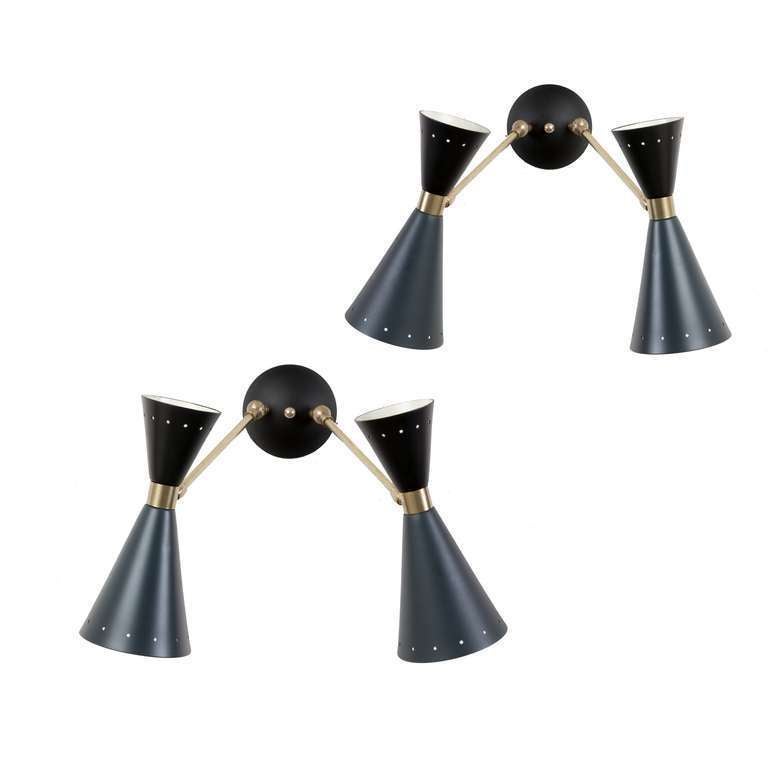 Pair of articulated wallights by Stilnovo with black and dark grey lacquered shades and brass arms.