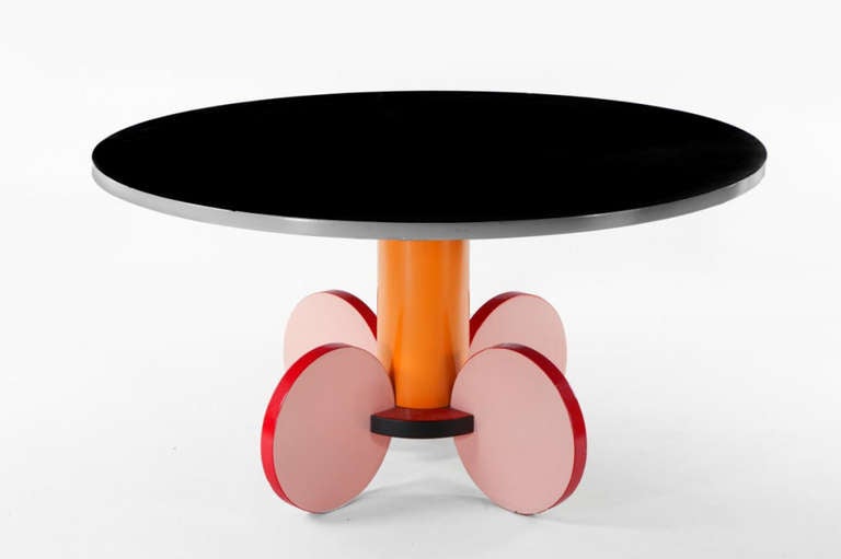 Dining table in laminated wood by Michele de Lucci manufactured by RB Rossana.

Michele De Lucci was born in Ferrera, Italy in 1951 and studied architecture at Padua and Florence until 1975 joining Cavart in 1973, a radical Design Group. In 1978