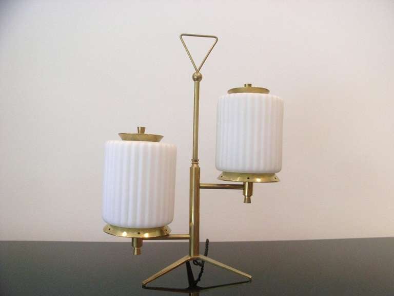 Stylish classic table lamp with two ribbed opaque glass shades attributed to Arteluce.