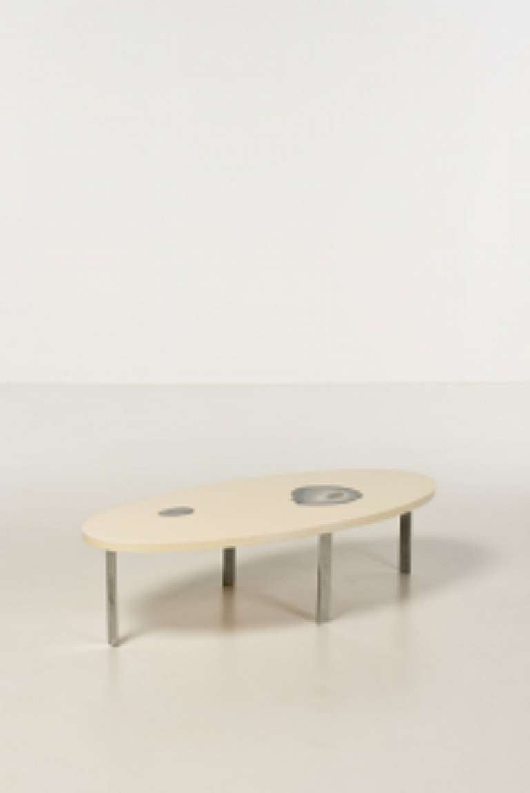 Large resin coffee table with stone inclusion and metal legs. Designed by Philippe Barbier.