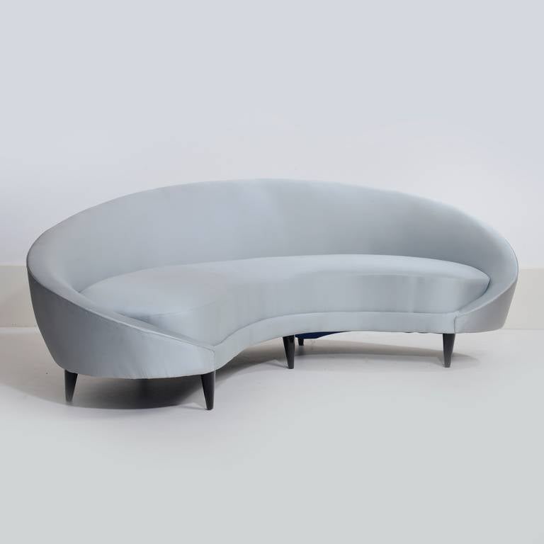Large elegant curved sofa with polished legs attributed to Ico Parisi, Italy, circa 1950s. Length 234 cm, height at back 73 cm, height at front 40 cm, depth 78 cm and 110 cm.
