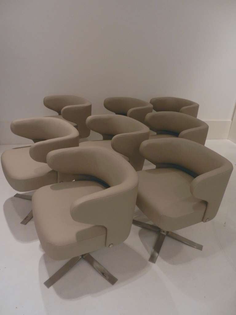 Set of eight Modernist dining chairs with steel bases reupholstered in taupe leather. Designed by Gianni Moscatelli for Formanova.