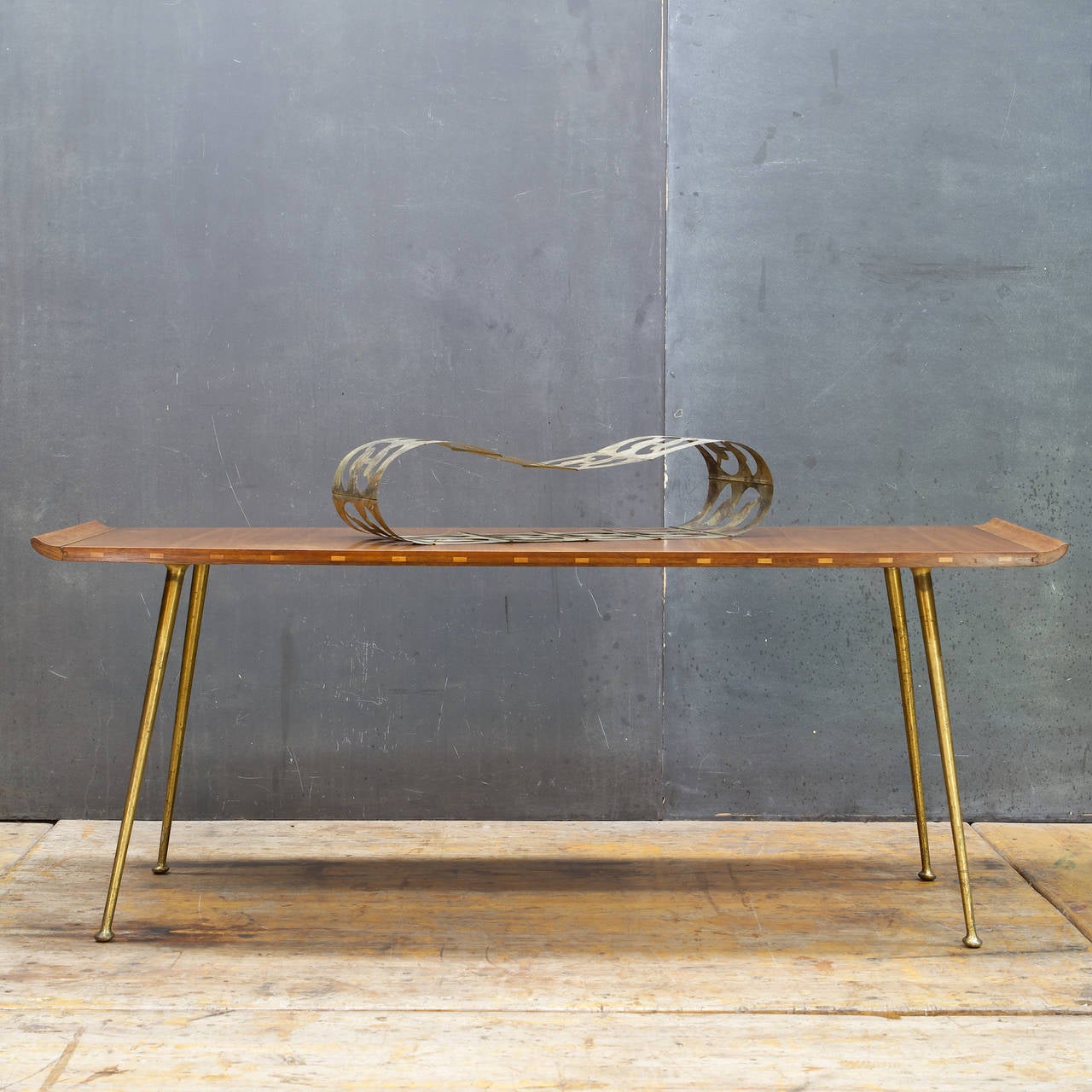 Antelope Splined & Winged Walnut, Brass Legged Sofa Coffee Table.  Lane marked Table Surface on salvaged Mid-Century Brass Slayed Legs.  Patina and Wear on all surfaces.  

W: 56¼ x D: 22 x H: 22 in.