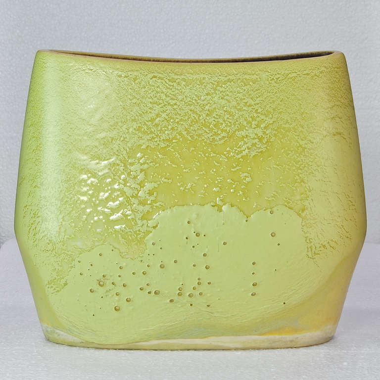 Russel Wright heavy art pottery was made for a brief period c.1945-1947 for Bauer, Los Angeles, CA  (1909-1962.) This vase is Catalog No.1A in Jonquil Yellow Glaze (Greenish-Yellow.) No Cracks to Vase, All Glaze Effects appear to be within