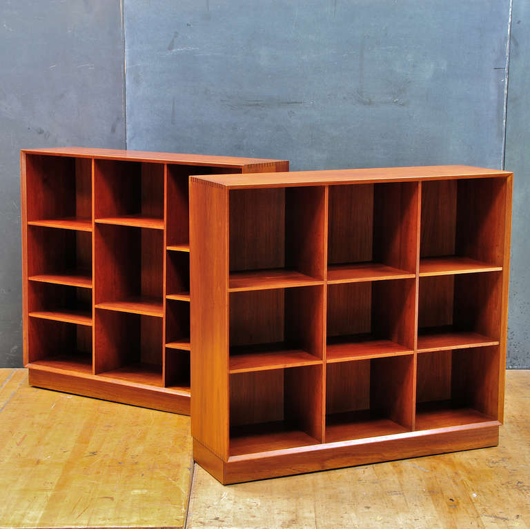 A pair of Rare Adjustable/Configureable Cubby Shelf Panels Small Bookcase Units.  Peter Hvidt for Soborg Mobler/John Stuart .  Old Growth Dark Hued Teak.  Good Vintage Condition.