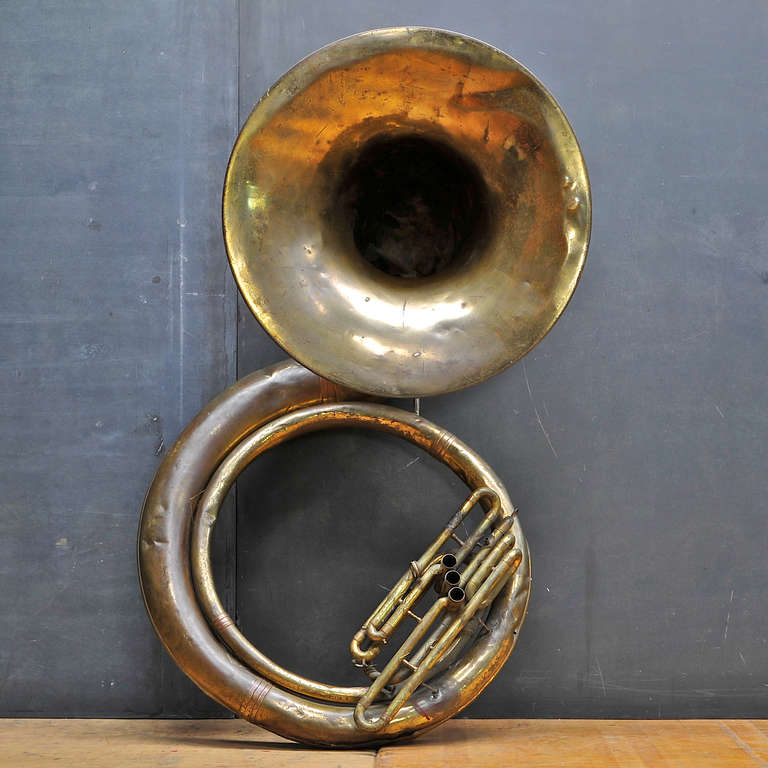 USA, c.1930s. Vintage and Monumental Brass Marching Band Salvage Scrap Sousaphone.

Width: 29 x Height: 49 in. *(Bell Dia: 26 in.)