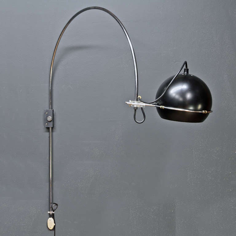 Vintage Mid-Century Modern and Rare GEPO Arc-Eye Wall Mount Reading Lamp in Very Good Vintage Condition, Lamp Head without Dents. Slate Connection Point.