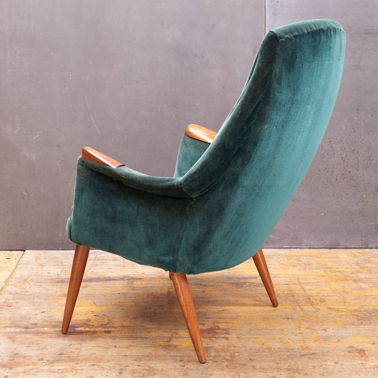 A Rare Teak Upholstered Chair, by uncommon maker. Beautiful Mid-Century Scandinavian Form designed by Gerhard Berg, Made in Sykkylven Norway.  Retains Metal Label. Sturdy Frame, No woodwork necessary, existing upholstery is bad, loose, the foam is