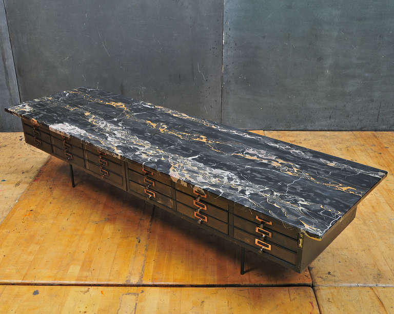 Vintage Industrial Assemblage Vault&Trust Co. Low Chest Coffee Table by Dino Paxenos.  Rare Black&Gold Portoro Marble Slab mined from the Palmaria Island Quarry. Stone Slab Unbroken, but does has Factory Repaired Cracks, Divets and Fills in Multiple