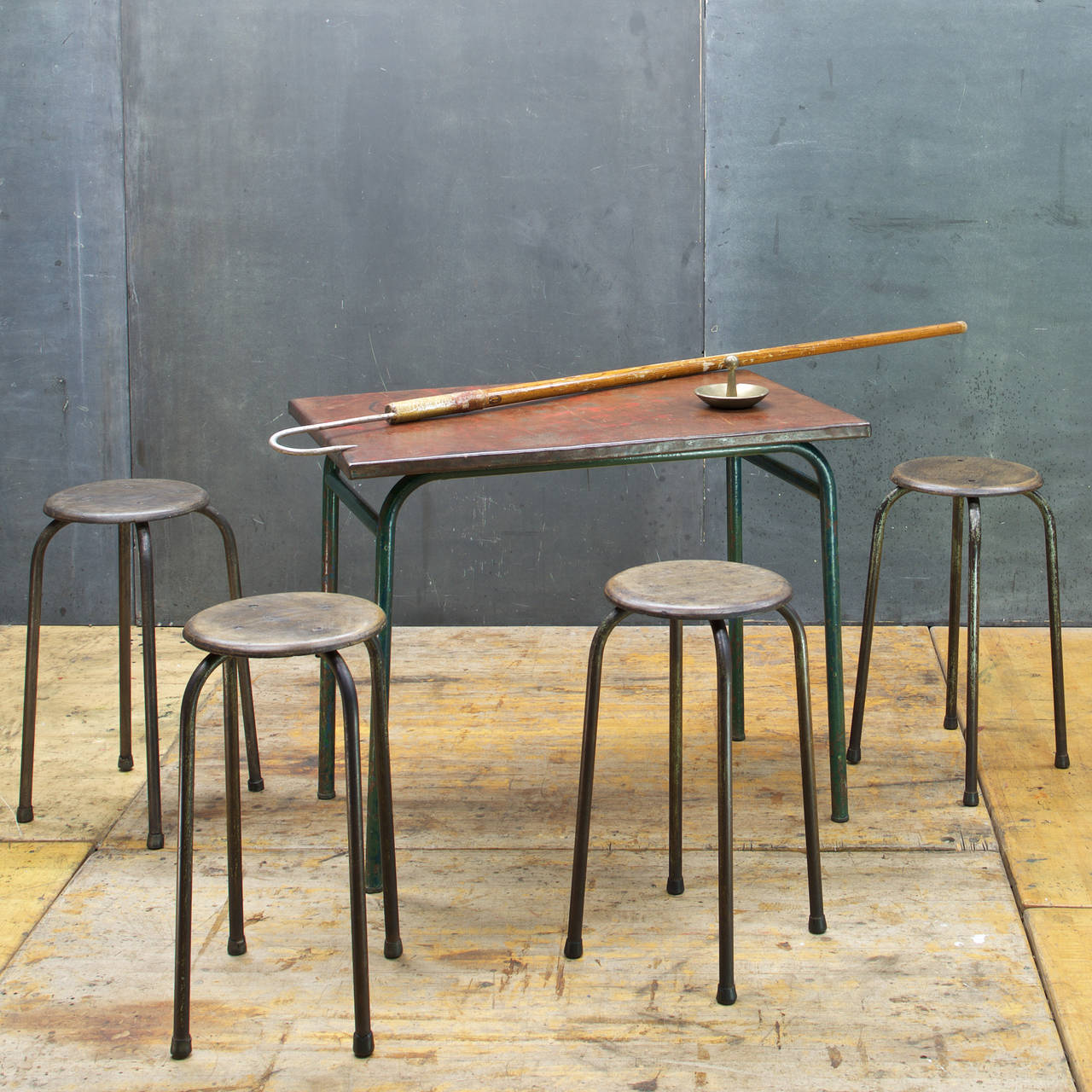 France, circa 1950s. Vintage French Industrial wooden and steel painter's or artist's stool, Set of four. In the manner of Jean Prouve.

Dia: 11¾ x Base W: 13 x H: 23½ in.