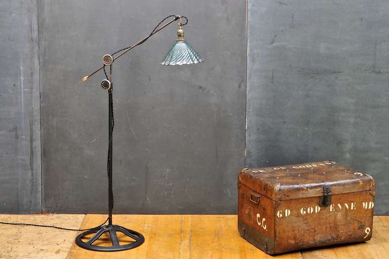 USA, c.1920s. Vintage Industrial Modern50 Assemblage of Vintage 1900s-1920s Lamp Parts and Cast Iron Stand. X-Ray Glass and Mercury Lantern Shade, Early Century Bryant Fatboy Socket and Fitter, Braided Clothe Lamp Cord. Highly Adjustable to just