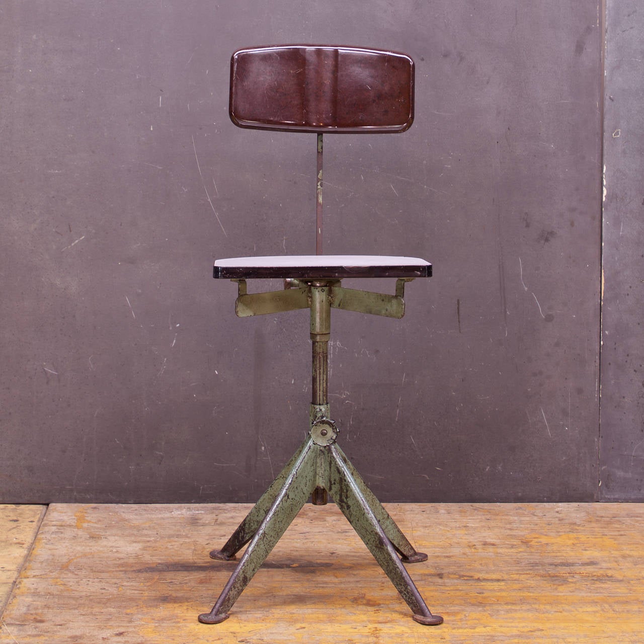 Vintage Industrial Steel/Bakelite Artists Work Chair, Fully Functional, Adjustable, Swivelling.  Designed by AB Odelberg Olsen of Sweden for the NK Department Store of Stockholm. Swivels, Adjustable (16