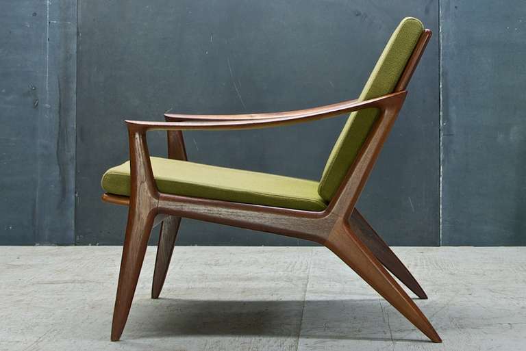 Per Øie for Stranda Lenestolfabrikk AS Norway. 

A rare early Scandinavian "Breakdown" armchair design. Great sculptural lines and elegant proportions. Frame is lacquered teak, brass and steel hardware and original fabric with newly and