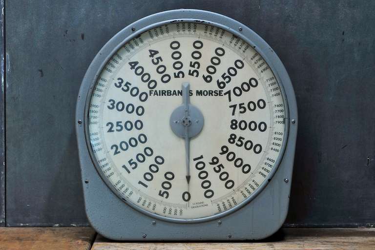 Fairbanks Morse vintage industrial heavy weight five ton scale face, USA, circa 1950s. Glass good, functionality unknown, mechanics are present, sold as a prop. Cart sold separately, not included. 

Exact Measurements
Width: 26 x Depth: 7½ x Height: