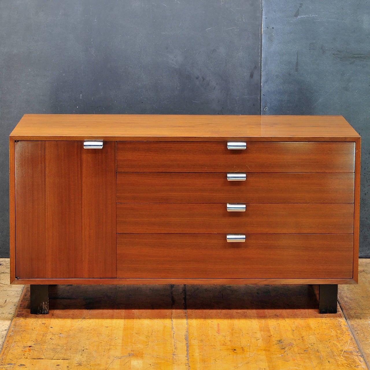 Original Finish and All Original as built from Herman Miller factory. 

USA, c.1960s. George Nelson and Associates 4712 Basic Cabinet Casegood Series in Walnut and Chrome. Very Good Vintage Condition, Original Finish, normal Wear.

W: 56¼ x D: 18½ x
