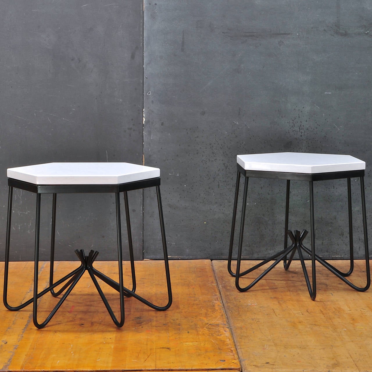 Jean Royere style Hirondelle Side Table, Iron Rod with Newly Cut Hexagonal Marble Tops, Excellent Construction. No Chips, Excellent Condition. Sold per piece.

W: 21 x D: 21 x H: 19½ in.